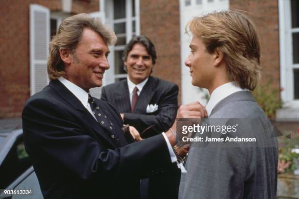 David Hallyday with his father Johnny Hallyday and his father-in-law Tony Scotti on his wedding day with Estelle Lefebure in St.-Martin de...
