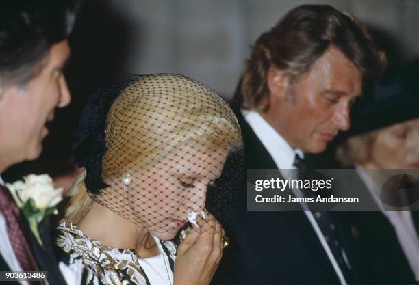 Sylvie Vartan and Johnny Hallyday at the wedding of their son David Hallyday with Estelle Lefebure, 15th September 1989