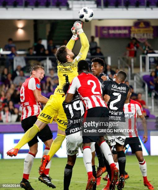 Goal keeper Caique França of Brazilian club Corinthians blocks a shot on goal during the second half against Dutch club PSV Eindhoven in their...