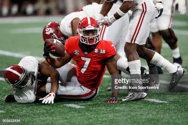 Georgia Bulldogs running back DAndre Swift looks to the official for a call during the College Football Playoff National Championship Game between...