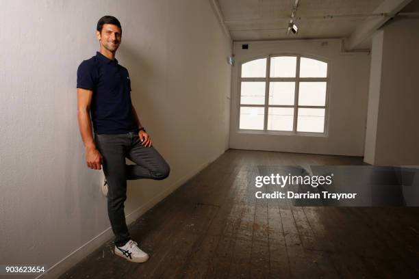 Novak Djokovic poses ahead of an ASICS Brand Ambassador Announcement on Batman Avenue Bridge on January 11, 2018 in Melbourne, Australia.