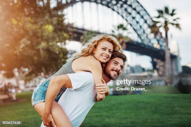 vital couple hugging and loving in park for st. valentine's day - australian culture stock pictures, royalty-free photos & images