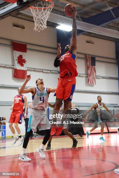 LaDontae Henton of the Agua Caliente Clippers dunks against Marcus Paige of the Greensboro Swarm during the NBA G League Showcase Game 4 on January...