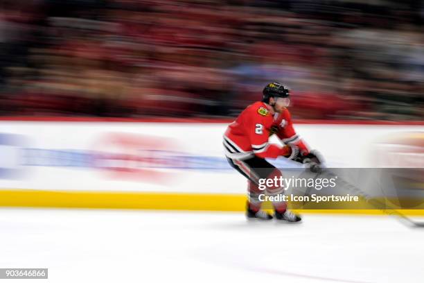 Chicago Blackhawks defenseman Duncan Keith chases a loose puck during a game between the Chicago Blackhawks and the Minnesota Wild on January 10 at...