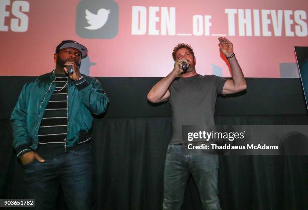 Curtis "50 Cent" Jackson and Gerard Butler attend The Den Of Thieves special screening at Regal South Beach on January 10, 2018 in Miami, Florida.