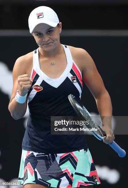 Ashleigh Barty of Australia celebrates winning match point in her quarter final match against Barbora Strycova of the Czech Republic during day five...