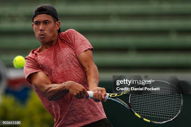 Jason Kubler of Australia plays a backhand against Yoshihito Nishioka of Japan during day three of the 2018 Kooyong Classic at Kooyong on January 11,...