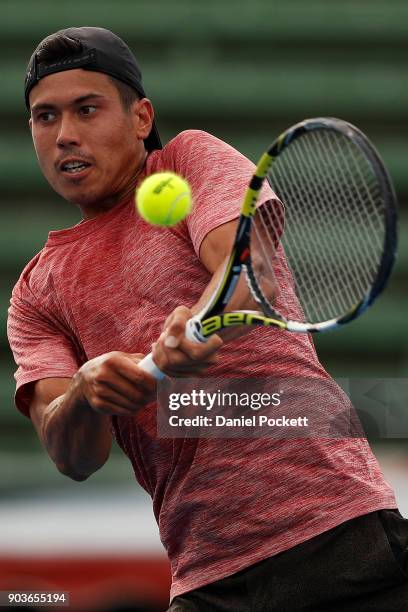 Jason Kubler of Australia plays a backhand against Yoshihito Nishioka of Japan during day three of the 2018 Kooyong Classic at Kooyong on January 11,...