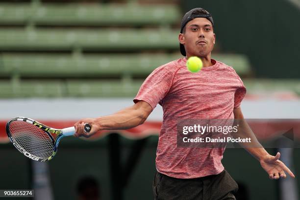 Jason Kubler of Australia plays a forehand against Yoshihito Nishioka of Japan during day three of the 2018 Kooyong Classic at Kooyong on January 11,...