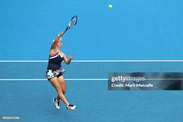 Ashleigh Barty of Australia hits a smash in her quarter final match against Barbora Strycova of the Czech Republic during day five of the 2018 Sydney...