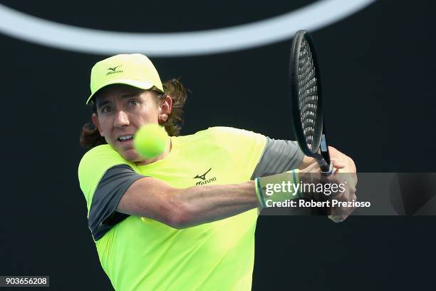 John-Patrick Smith of Australia competes in his second round match against Cameron Norrie of United Kingdom during 2018 Australian Open Qualifying at...