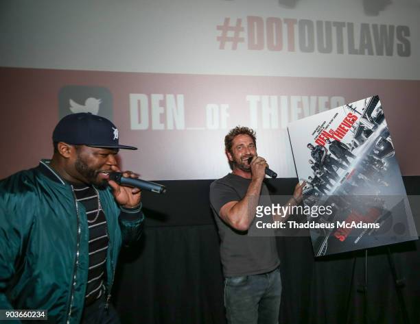 Curtis "50 Cent" Jackson and Gerard Butler at The Den of Thieves special screening at Regal South Beach on January 10, 2018 in Miami, Florida.
