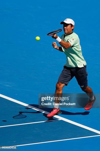 Yoshihito Nishioka of Japan plays a forehand against Jason Kubler of Australia during day three of the 2018 Kooyong Classic at Kooyong on January 11,...