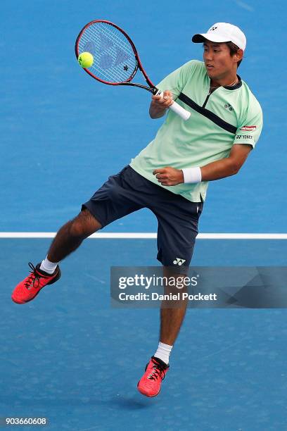 Yoshihito Nishioka of Japan plays a right-handed forehand against Jason Kubler of Australia during day three of the 2018 Kooyong Classic at Kooyong...