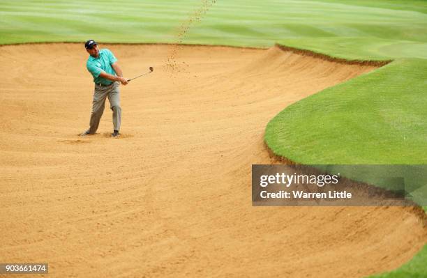 Hennie Otto of South Africa plays from a bunker on the 17th hole during Day One of The BMW South African Open Championship at Glendower Golf Club on...
