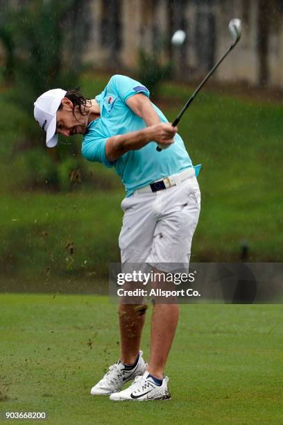 Tommy Fleetwood of Europe plays a shot on the 15th hole during the ProAm of the 2018 EurAsia Cup presented by DRB-HICOM at Glenmarie G&CC on January...