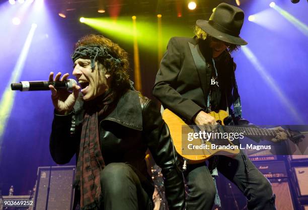 Singer Gary Cherone and recording artist Joe Perry perform during a Monster Inc. CES party at Brooklyn Bowl Las Vegas at The Linq Promenade on...