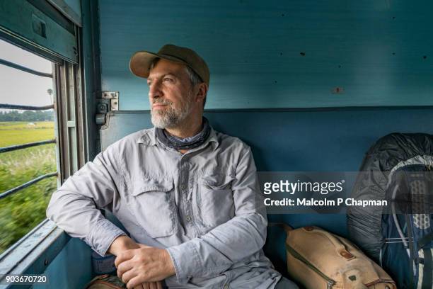 traveller on indian train - railway passenger - india train stock pictures, royalty-free photos & images