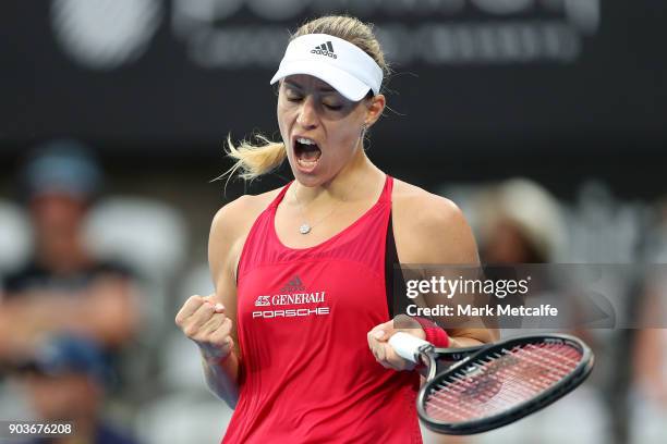 Angelique Kerber of Germany celebrates winning a point in her quarter final match against Dominika Cibulkova of Slovakia during day five of the 2018...