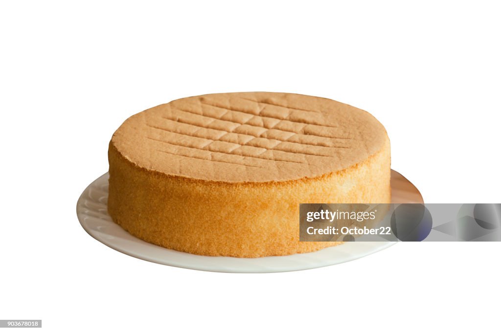 Homemade chiffon or sponge cake on white plate on white isolated background with clipping paths. Homemade bakery concept to present foam type cake so soft and lite good smell and delicious.