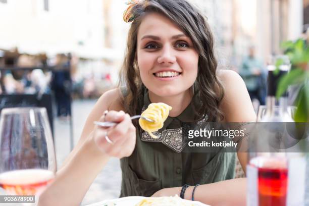 well being in rome - the joys of eating spaghetti stock pictures, royalty-free photos & images