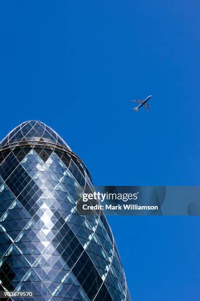 the gherkin and aircraft. - boeing stock pictures, royalty-free photos & images