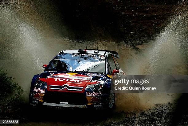 Sebastien Loeb of France and Daniel Elena of Monaco compete in their Citroen C4 Total during the Repco Rally of Australia Special Stage 32 on...