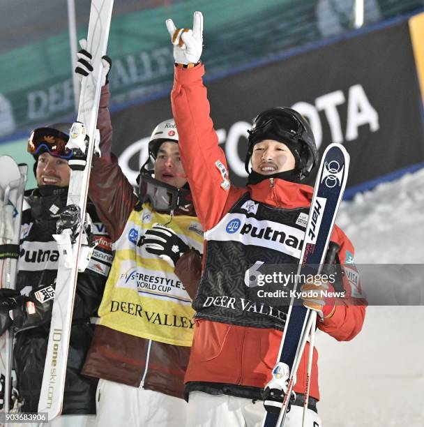 Japanese freestyle skier Sho Endo celebrates after winning silver in the men's final of a World Cup moguls event in Deer Valley, Utah, on Jan. 10,...