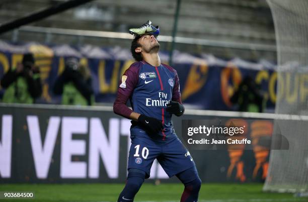 Neymar Jr of PSG celebrates his goal with his Nike shoe on his head during the French League Cup match between Amiens SC and Paris Saint Germain at...