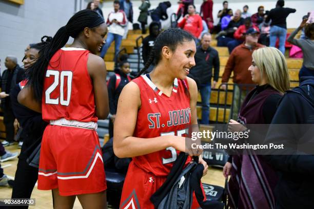 St. John's Cadets Azzi Fudd smiles as she celebrates the 51-45 win over the Paul VI Panthers January 03, 2018 in Fairfax, VA. The St. John's Cadets...