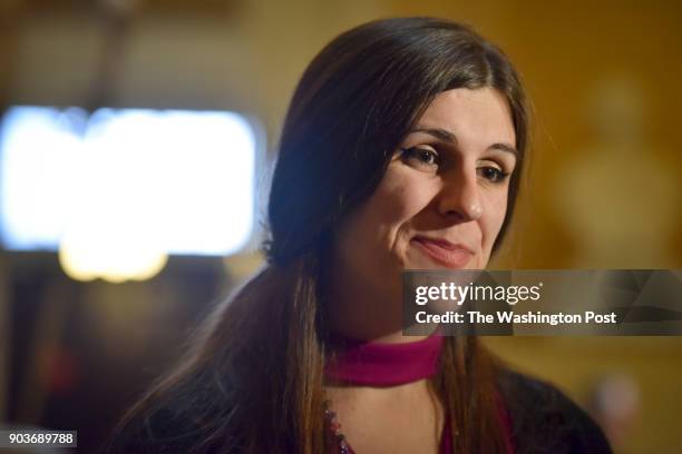 Delegate Danica Roem chats with the media on her first day in office during the opening session of the House of Delegates at the Virginia State...