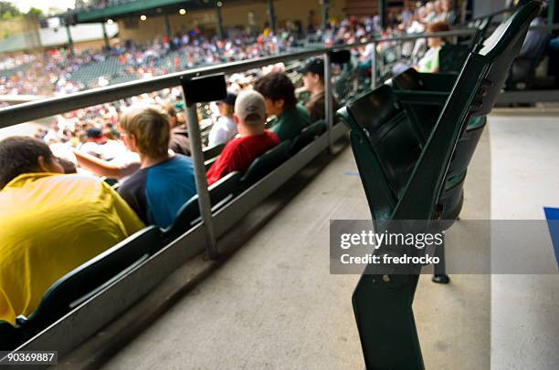 skybox view of packed stadium bleacher seats at sports event - spectator seats stock pictures, royalty-free photos & images