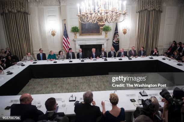 President Donald Trump speaks during an American Technology Council roundtable in the State Dinning Room at the White House in Washington, DC on...