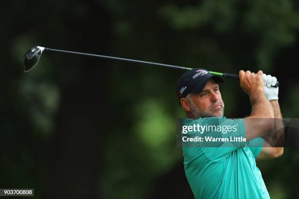Hennie Otto of South Africa tees off on the 18th hole during Day One of The BMW South African Open Championship at Glendower Golf Club on January 11,...