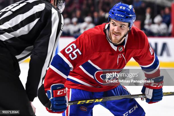 Andrew Shaw of the Montreal Canadiens looks towards the linesman prior to a face-off against the Vancouver Canucks during the NHL game at the Bell...