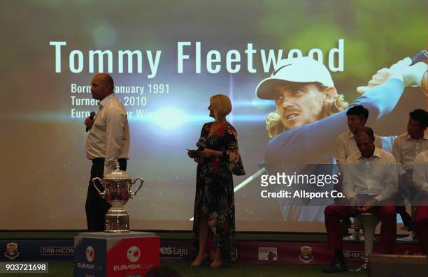 Team Europe captain Thomas Bjorn introduces his players while the picture of Tommy Fleetwood is flashed on stage during the opening ceremony prior to...