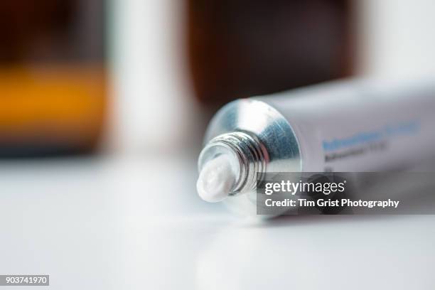 tube of hydrocortisone cream - anabolic steroids stock pictures, royalty-free photos & images