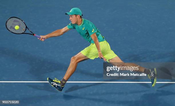 Alex de Minaur of Australia plays a forehand in his quarter final match against Feliciano Lopez of Spain during day five of the 2018 Sydney...