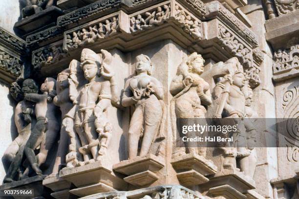 stone carviong on the facade of the lakshmana temple - lakshmana temple stock pictures, royalty-free photos & images
