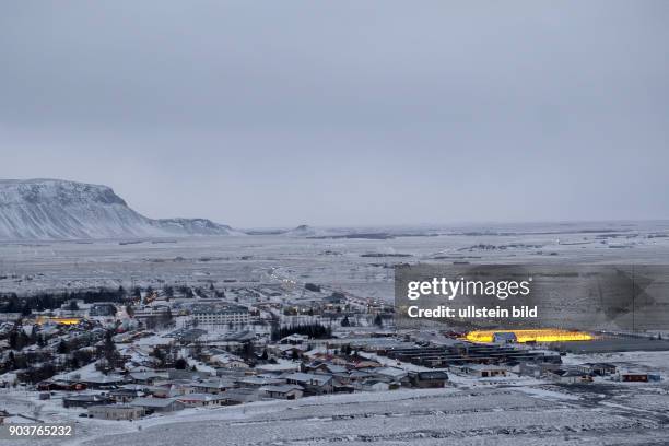 Geld leuchten die mit Erdwärme betrieben Gewächshäuser in der Stadt Hveragerði in Island