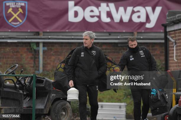 Alan Irvine and Billy McKinlay of West Ham United come out prior to training at Rush Green on January 11, 2018 in Romford, England.