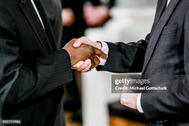 Berlin, Germany Gerd Mueller, Minister for development and economic cooperation, recieves an african diplomat at New Years Reception for Diplomats at...