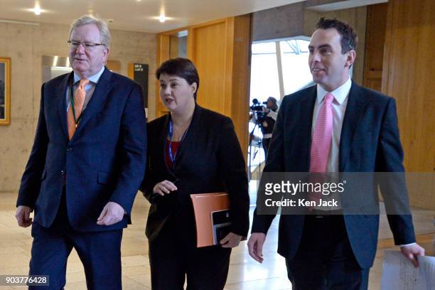 Scottish Conservative leader Ruth Davidson on her way to First Minister's Questions in the Scottish Parliament flanked by her deputy Jackson Carlaw...