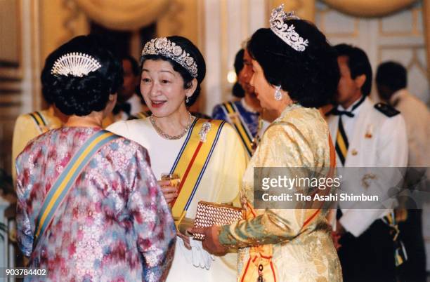Empress Michiko talks with guests prior to the state dinner at the Istana Negara on September 30, 1991 in Kuala Lumpur, Malaysia.