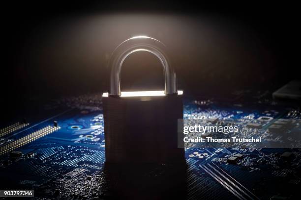 Berlin, Germany Symbolic photo on the topic Data security. A padlock is on the board of a computer on January 11, 2018 in Berlin, Germany.