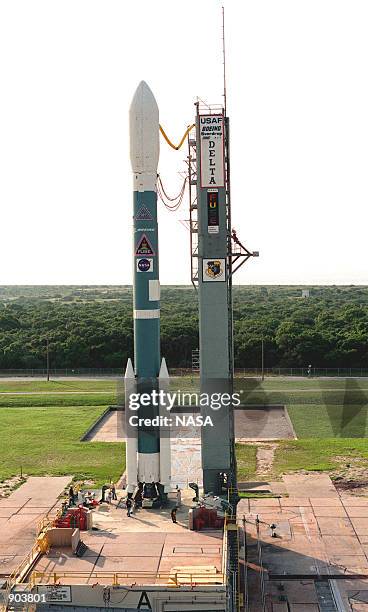 S Far Ultraviolet Spectroscopic Explorer satellite sits on Launch Pad 17A, Cape Canaveral Air Station, aboard the Boeing Delta II rocket waiting for...