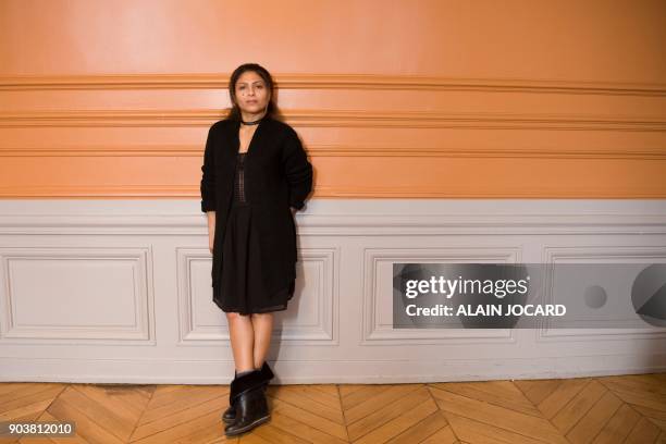 Ensaf Haidar, wife of jailed Saudi blogger Raif Badawi, poses for pictures on January 10 in Paris. Ensaf Haidar, mother to the couple's three...