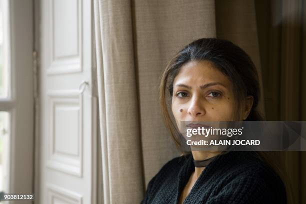 Ensaf Haidar, wife of jailed Saudi blogger Raif Badawi, poses for pictures on January 10 in Paris. Ensaf Haidar, mother to the couple's three...