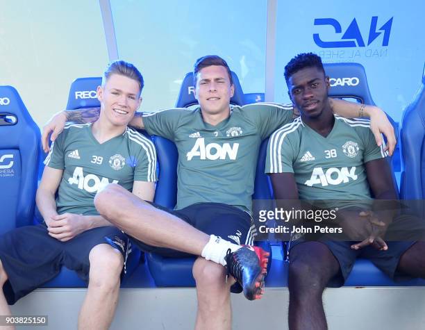 Scott McTominay, Victor Lindelof and Axel Tuanzebe of Manchester United in action during a first team training session at Nad Al Sheba Sports Complex...