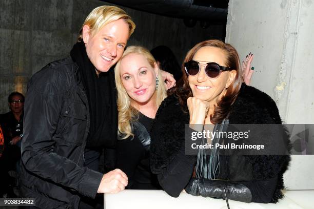 Daniel Benedict, Amy Sacco and Donna Karan attend The Cinema Society & Bluemercury host the after party for IFC Films' "Freak Show" at Public Arts on...